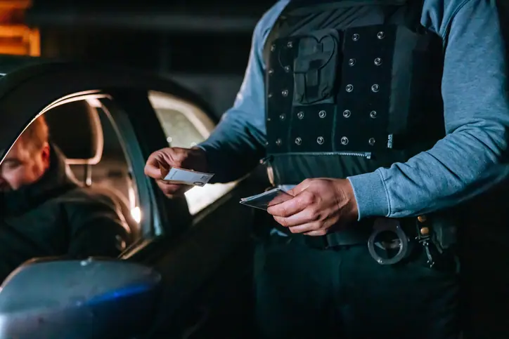 police officer issuing a ticket